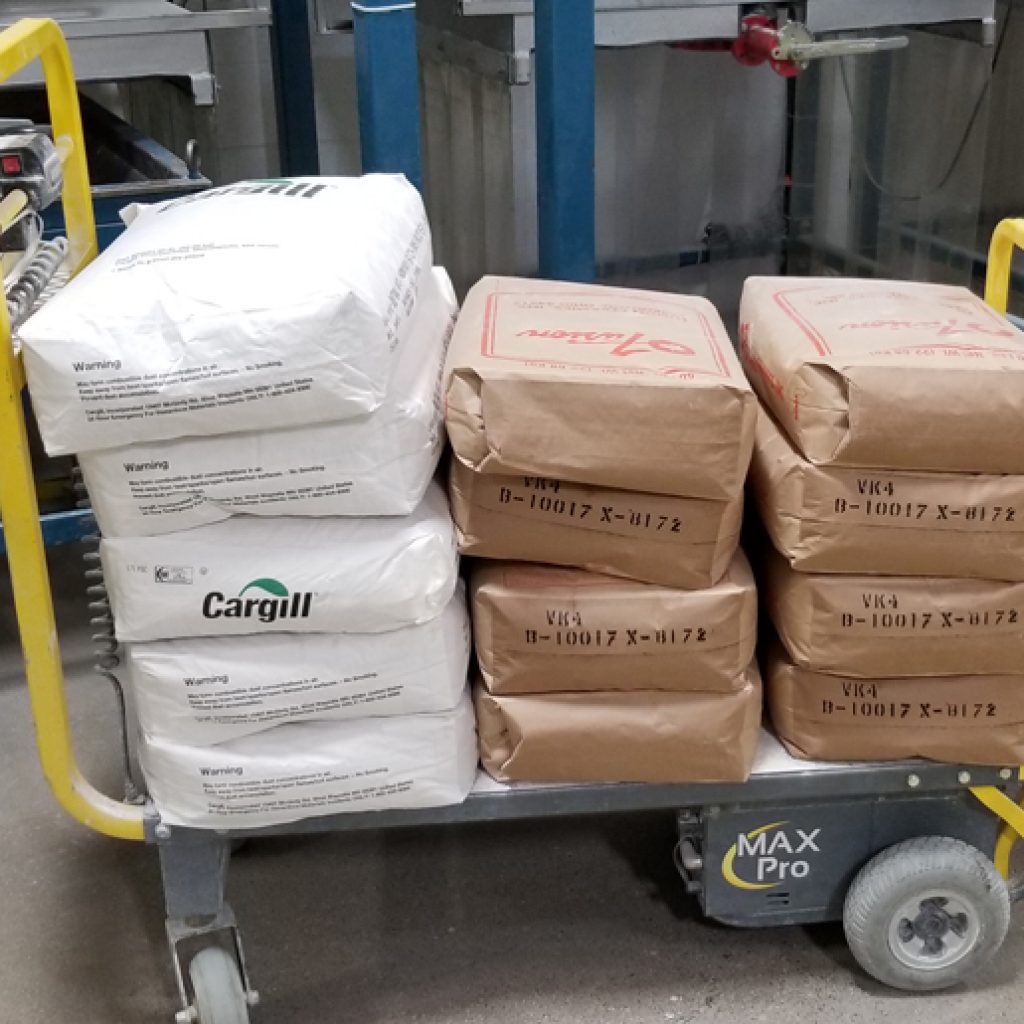 Boride Engineered Abrasives using a motorized material handling cart