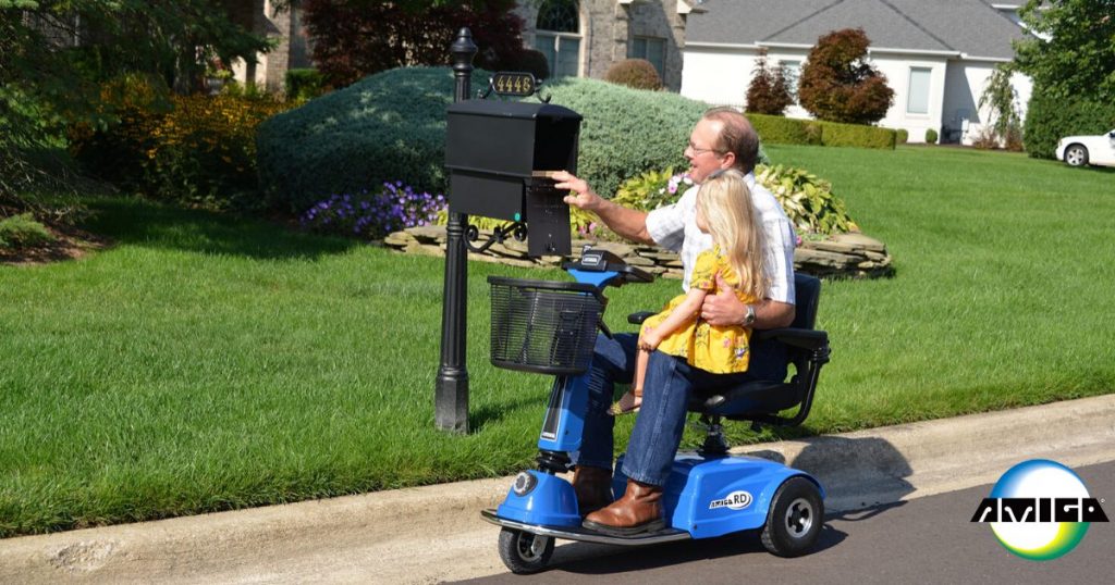 Grandfather and graddaughter checking mail on Amigo RD