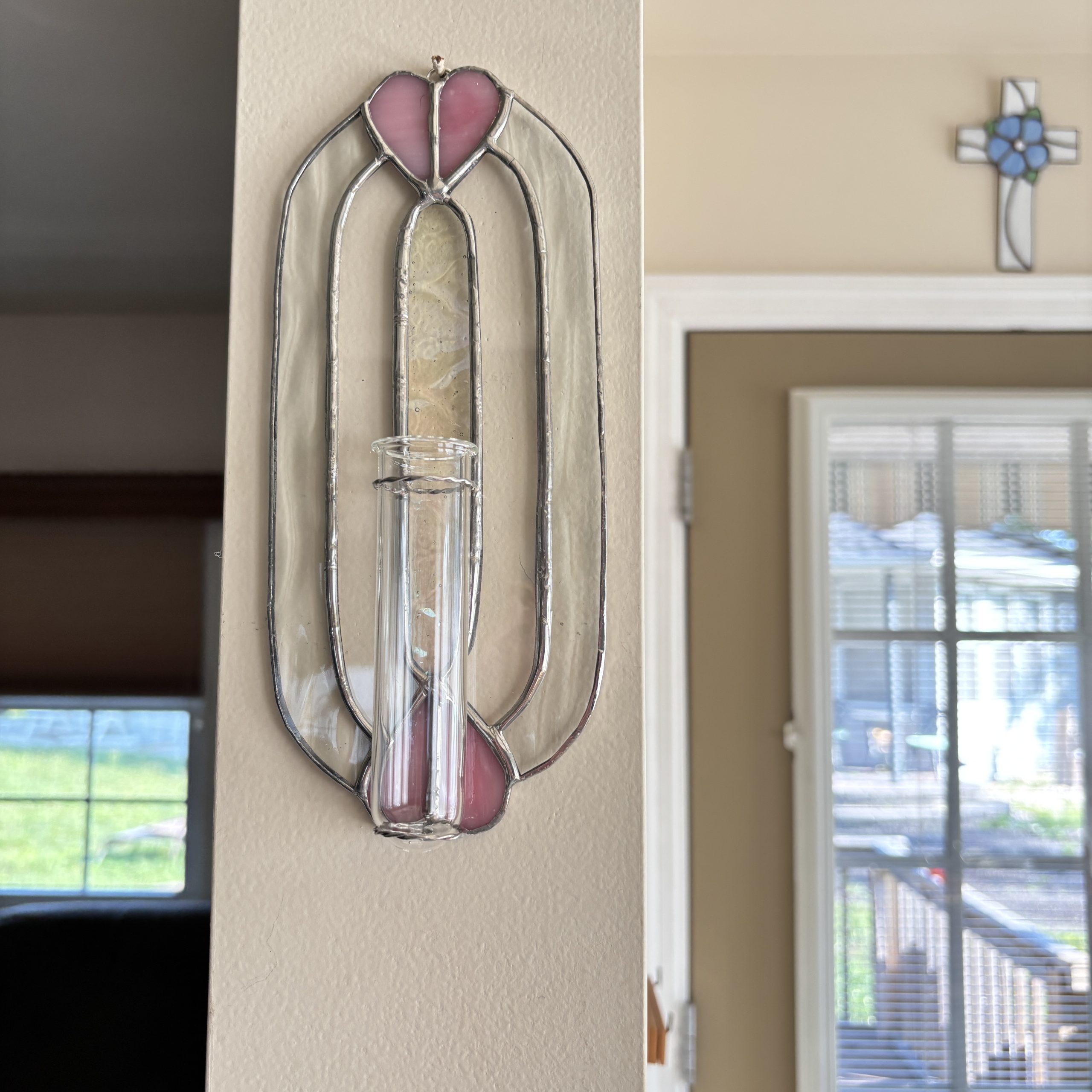 Lori's stained glass art: hearts and cross.
