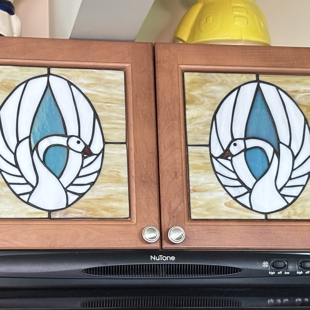 Lori's stained glass art: two swans.