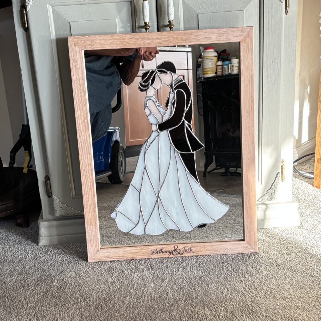 Lori's stained glass art: bride and groom.
